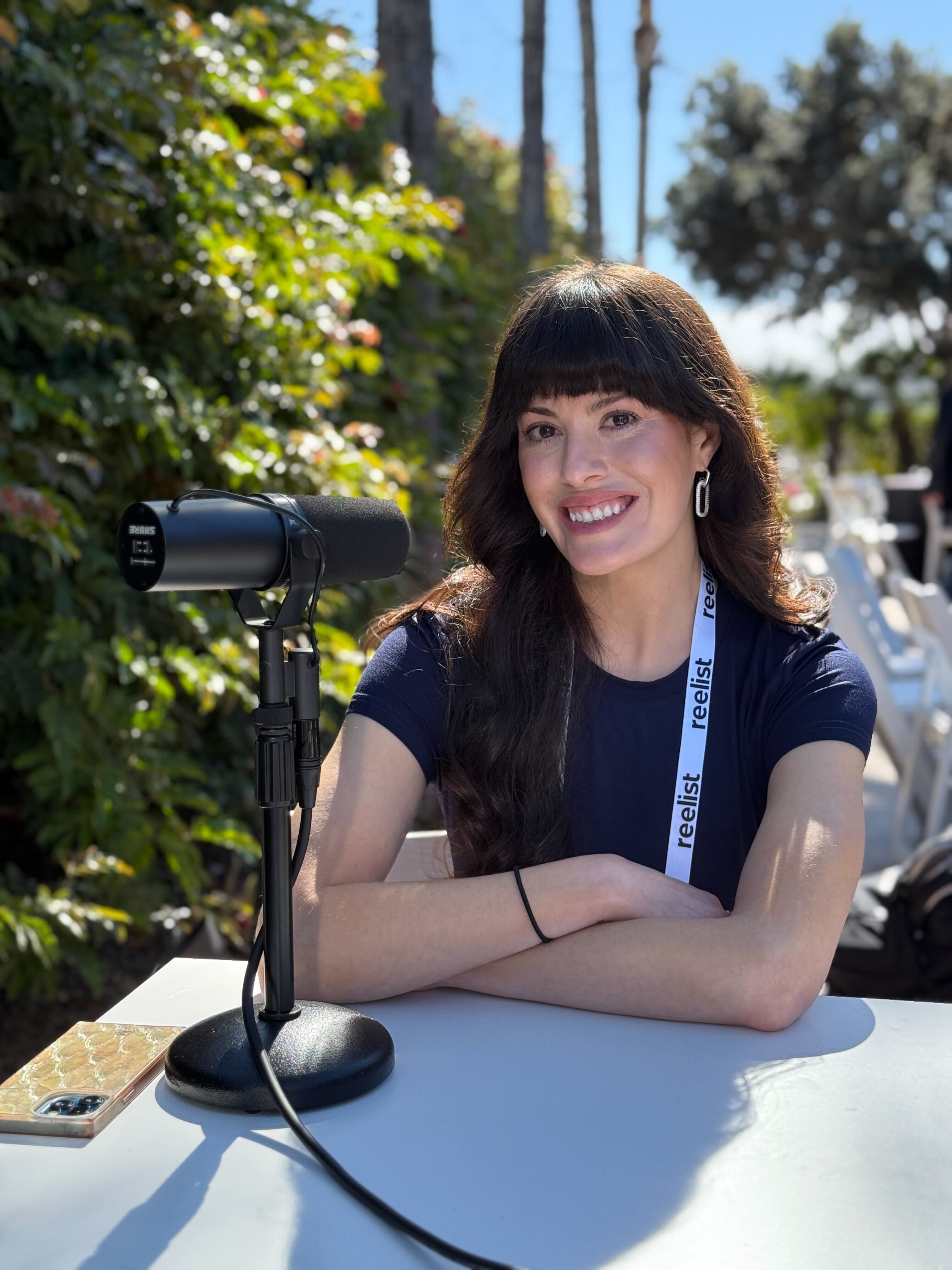 Greenhouse Roadshow guest speaking into a microphone